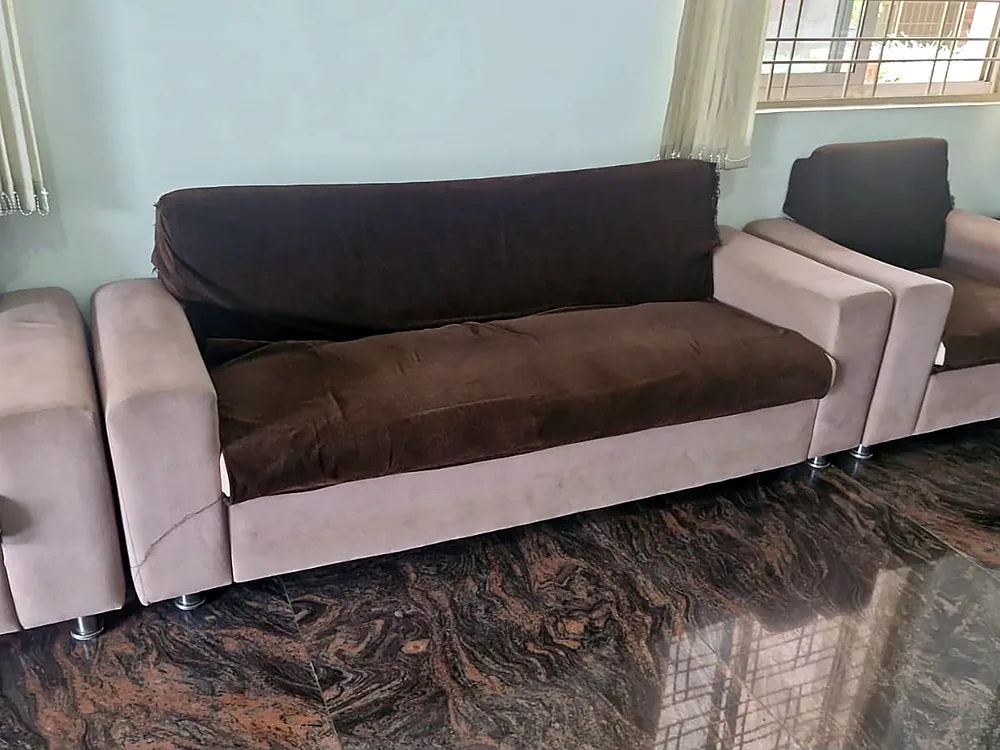 Open-ended sectional in a deep blue weave