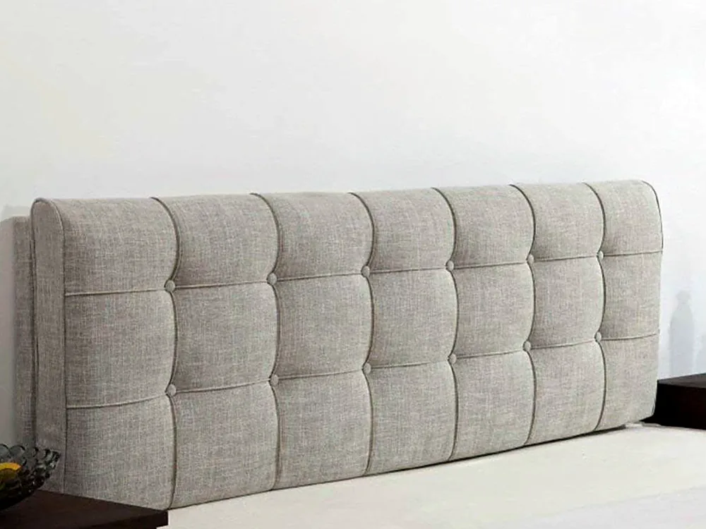 Buttoned headboard in an oatmeal weave