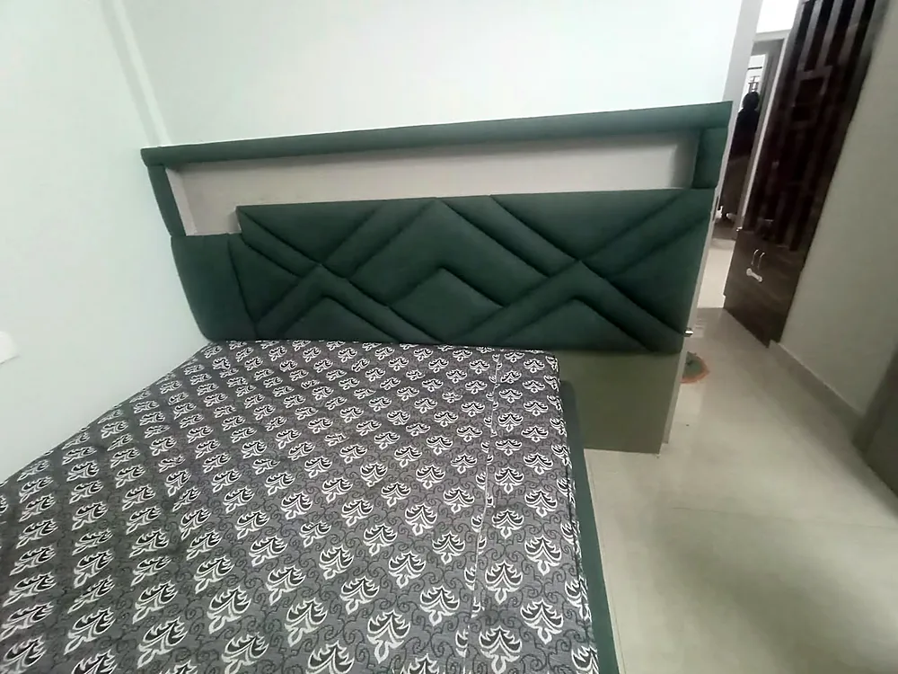Chevron headboard in a forest green weave