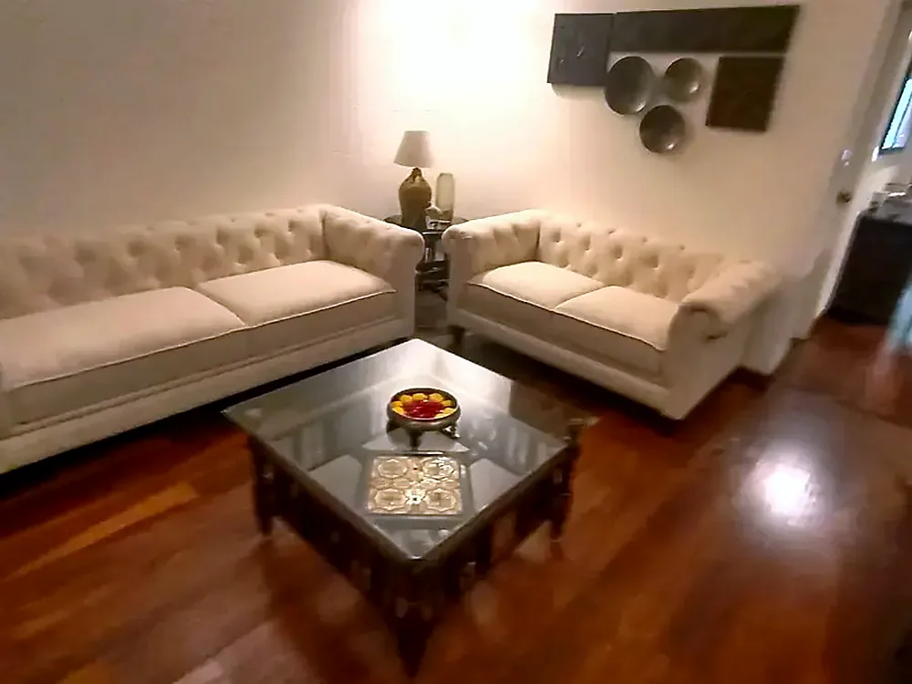 Cream three-piece set in a warm room